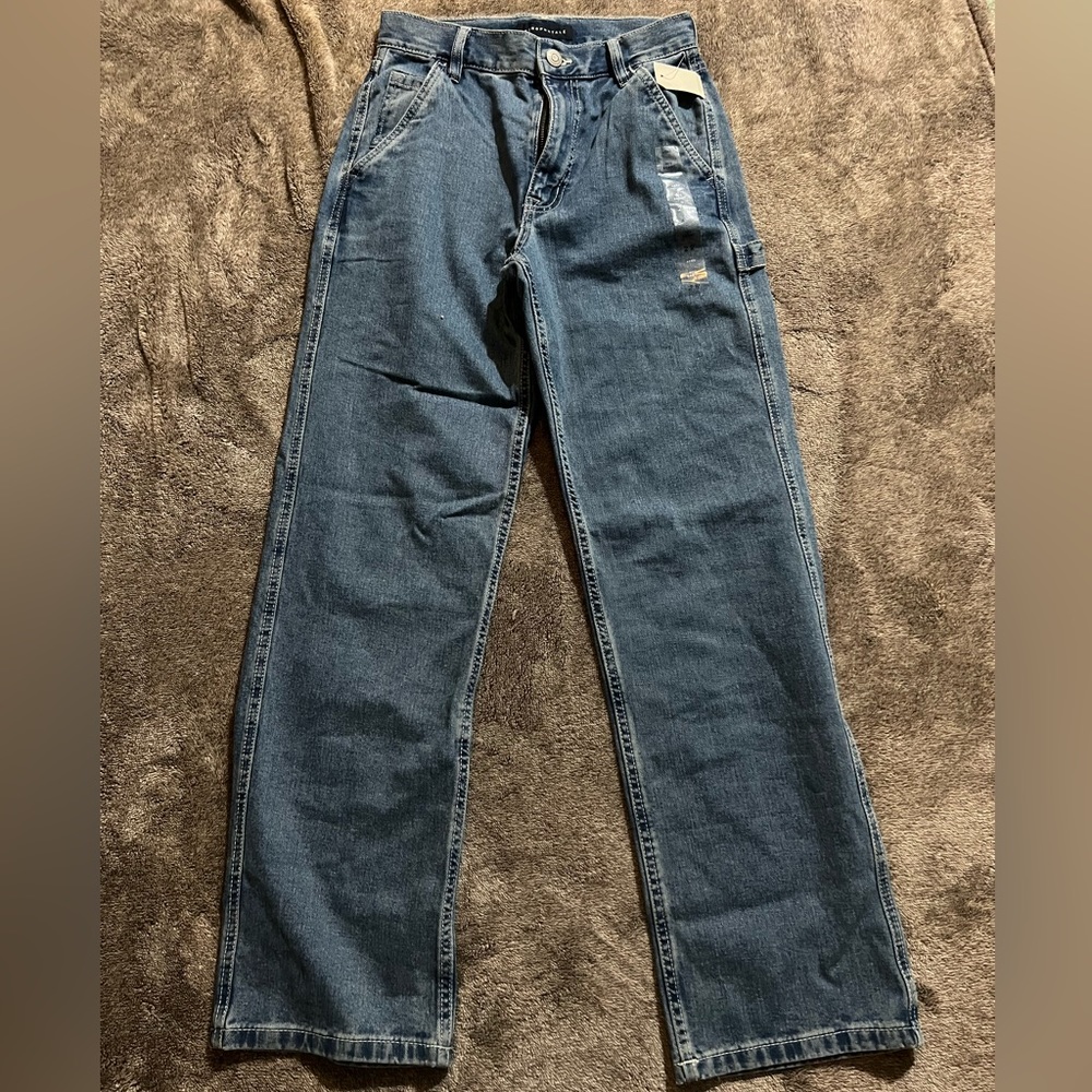 90s style dark wash baggy jeans